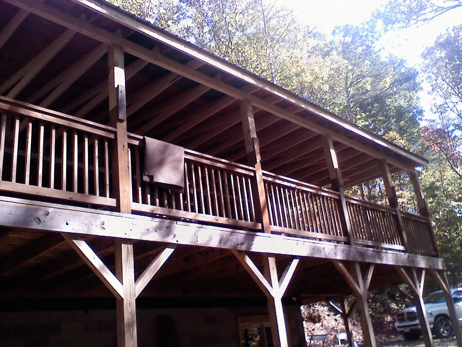 Timber framing under a new elevated porch and deck — Roof Leak Repair in Cement City by Roofing Brothers
